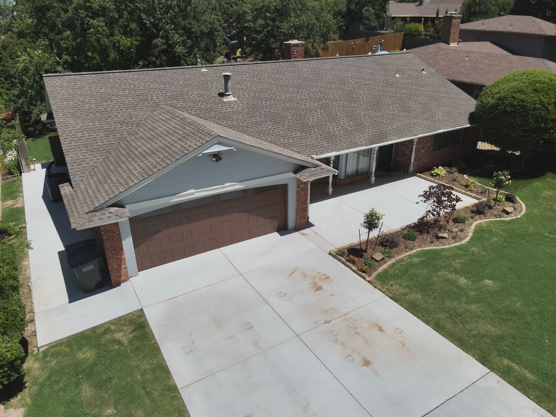 New home front yard landscape installation and design in Oklahoma