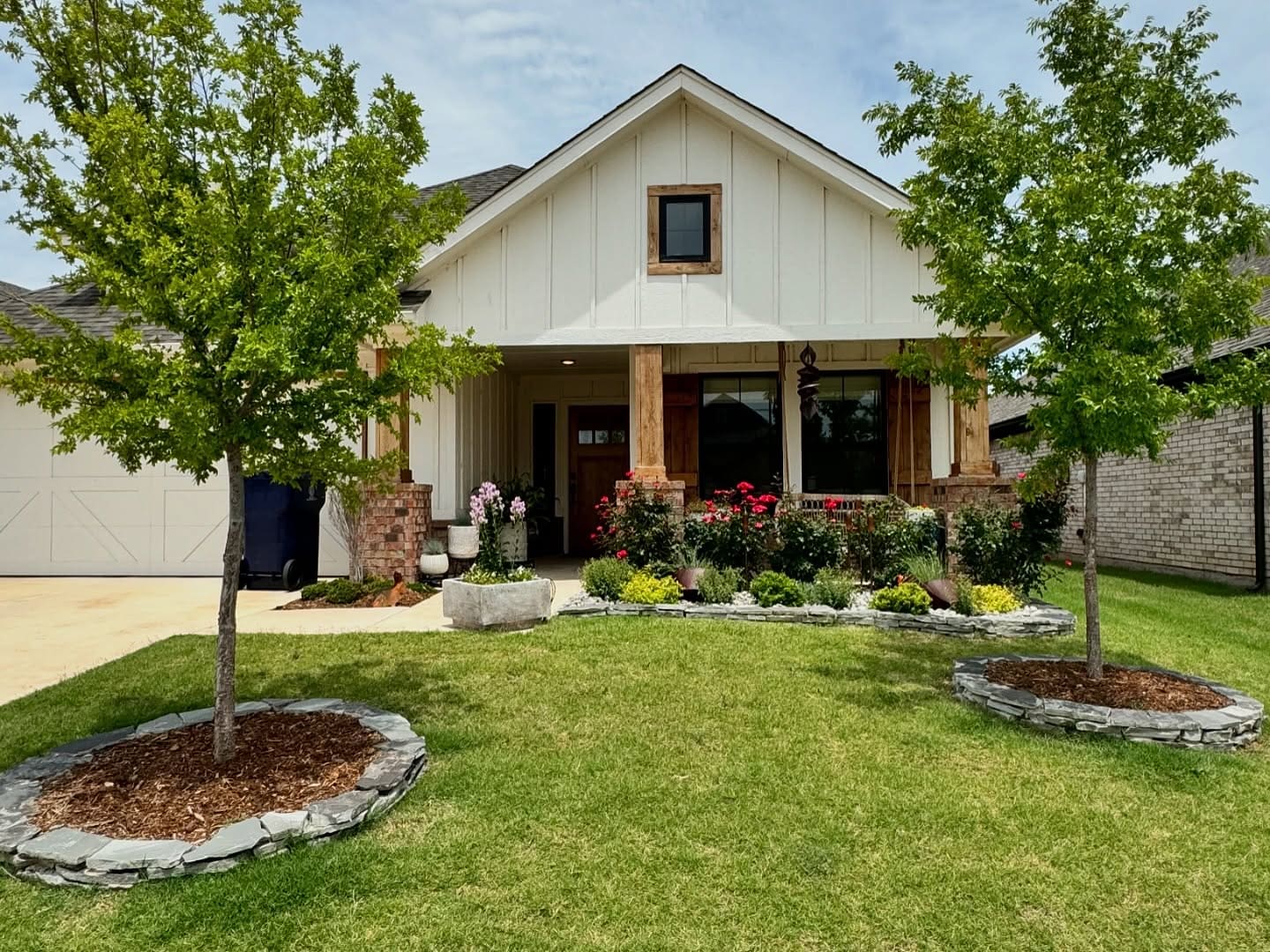 Front yard landscape design with flower beds in Oklahoma