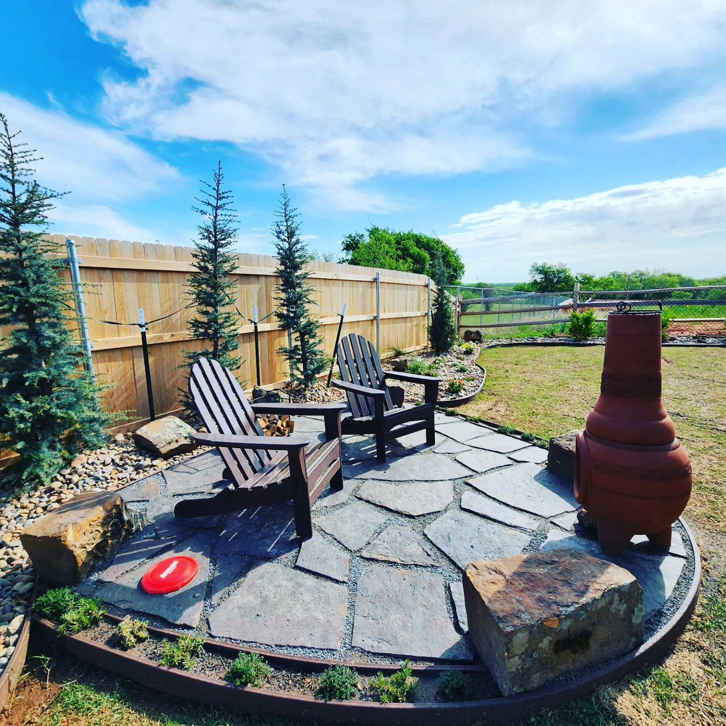 Flagstone patio installation on a Deer Creek, Oklahoma property